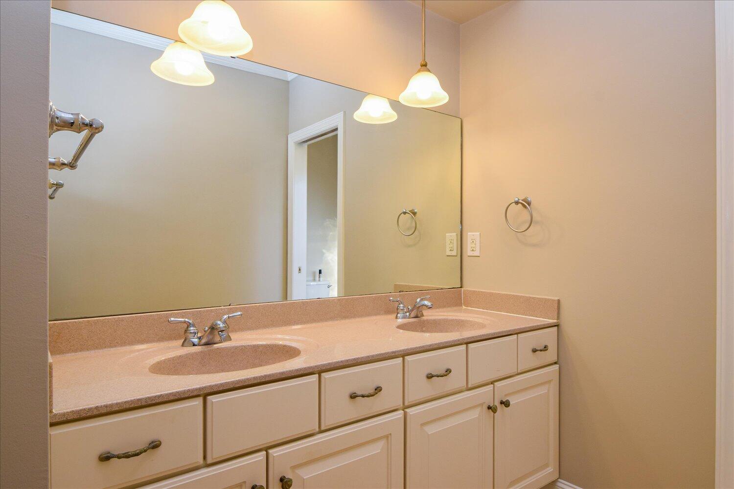 2271 Countryside Road Northwest Roanoke, VA 24017 - Photo 12 of 27 a bathroom with a sink and a mirror