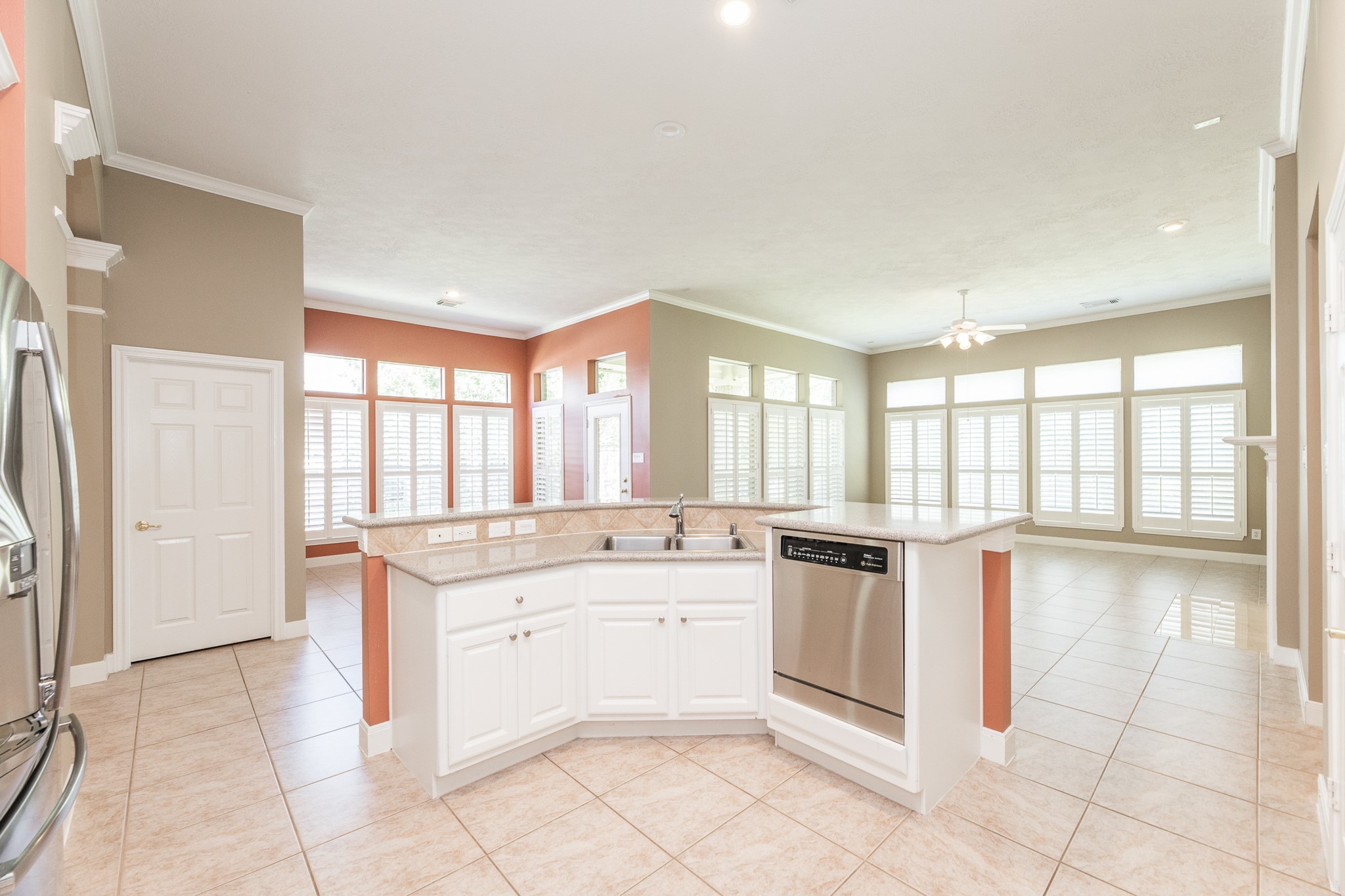 1222 Brinson Court Spring, TX 77379 - Photo 20 of 35 a large white kitchen with a large window