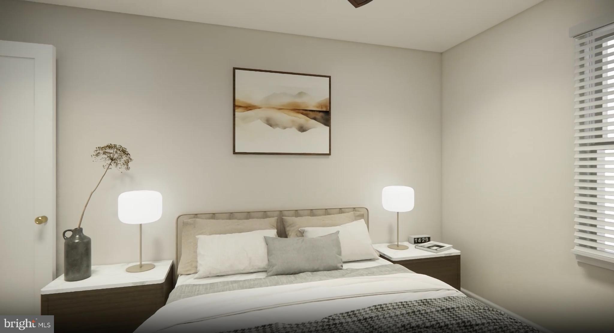 2213 Washington Avenue, Unit 101 Silver Spring, MD 20910 - Photo 14 of 25 a bedroom with a bed and a painting on the wall