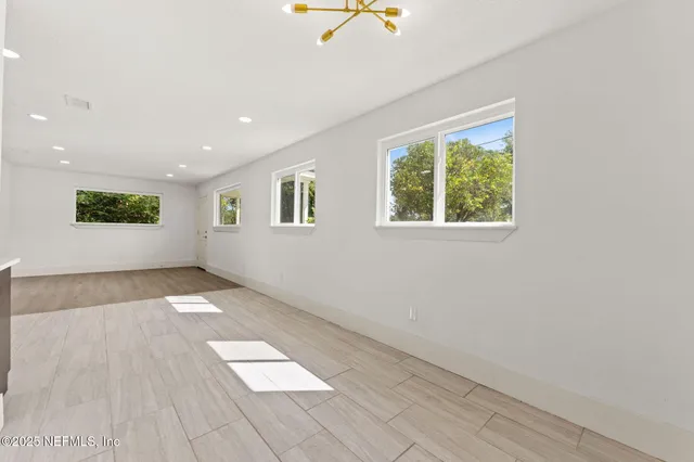 an empty room with windows