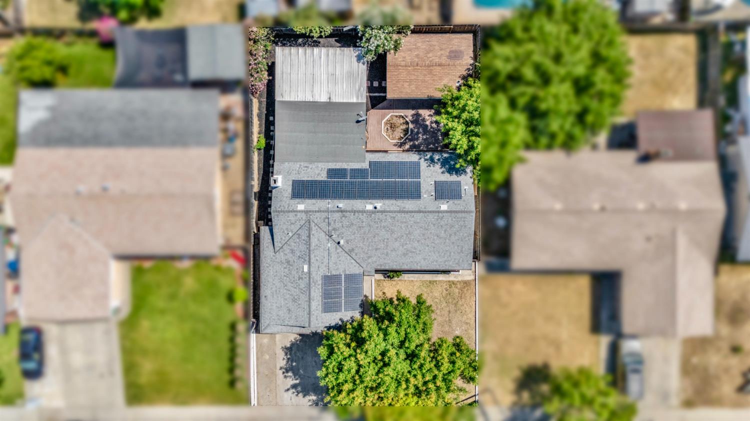 2832 Fowler Road Ceres, CA 95307 - Photo 24 of 28 aerial view of a house with plants and large trees