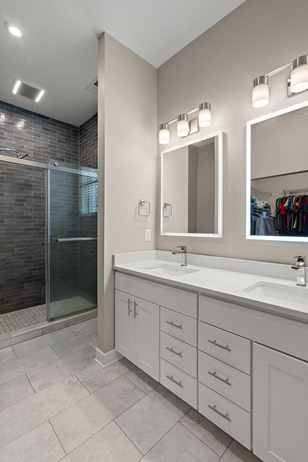 207 Academy Street, Unit 106 Valparaiso, IN 46385 - Photo 18 of 43 a bathroom with double vanity and a mirror