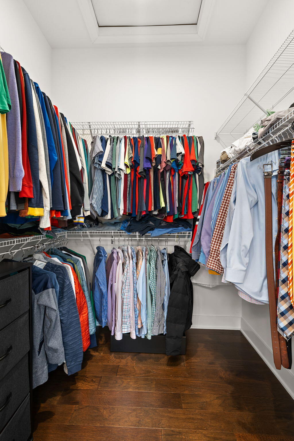 207 Academy Street, Unit 106 Valparaiso, IN 46385 - Photo 21 of 43 a view of walk in closet with clothes and shoes
