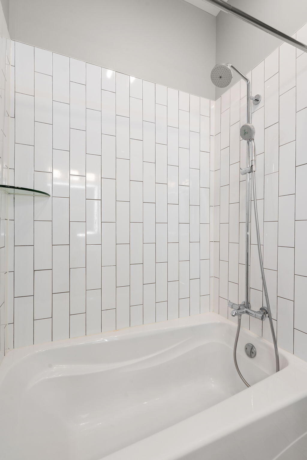 207 Academy Street, Unit 106 Valparaiso, IN 46385 - Photo 23 of 43 a bathroom with a bathtub and a shower