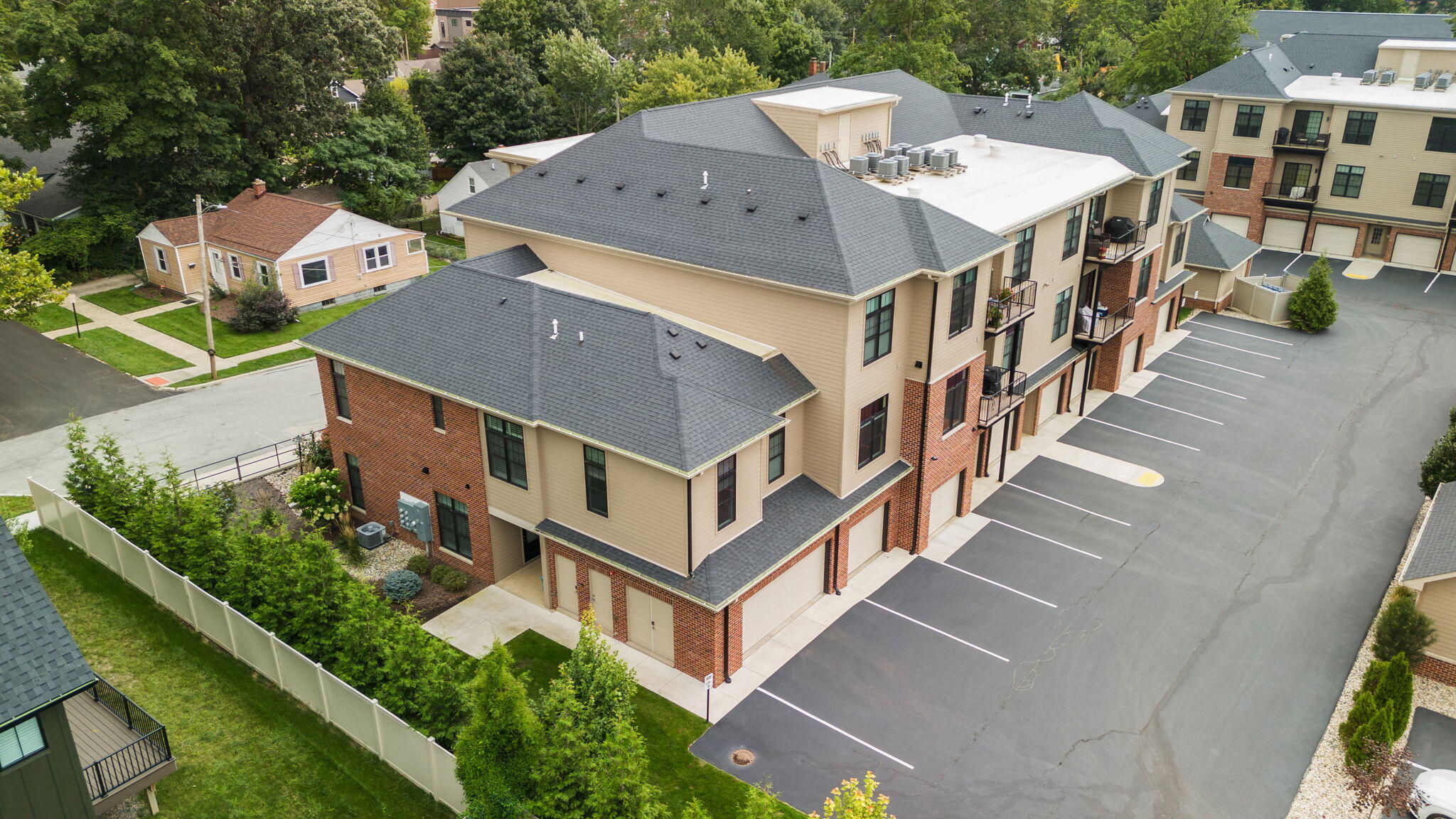 207 Academy Street, Unit 106 Valparaiso, IN 46385 - Photo 40 of 43 an aerial view of multiple houses with a yard