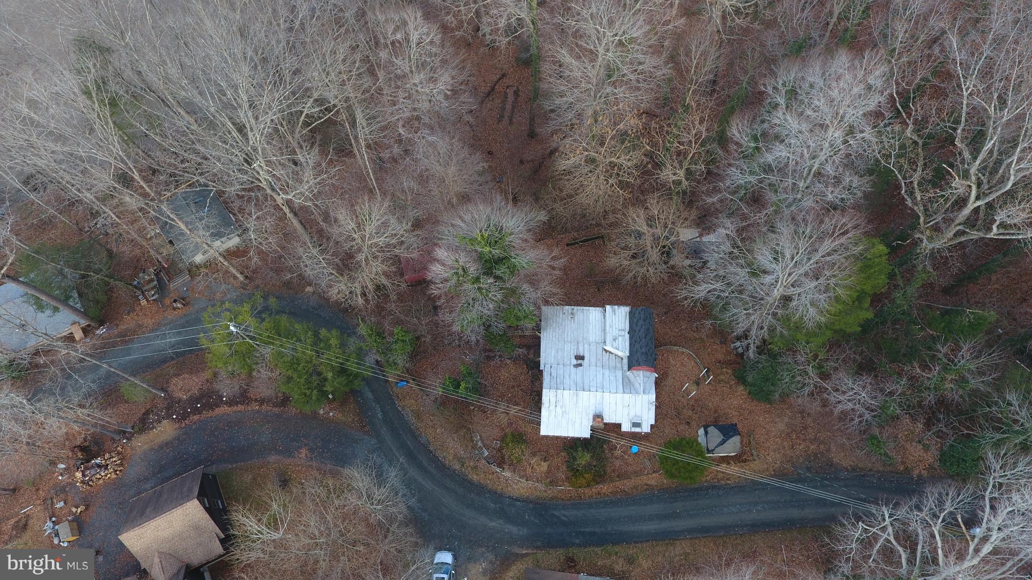8570 Cobb Road Manassas, VA 20112 - Photo 2 of 46 Aerial view of the road & house with metal roof