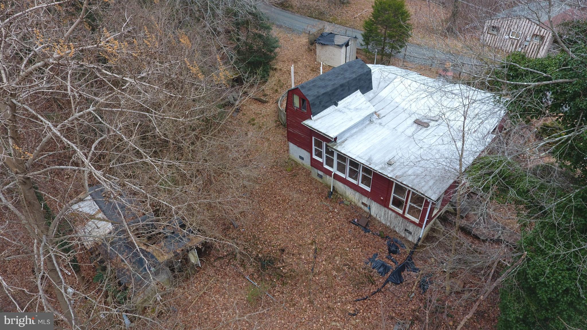 8570 Cobb Road Manassas, VA 20112 - Photo 11 of 46 Dilapidated shed below house
