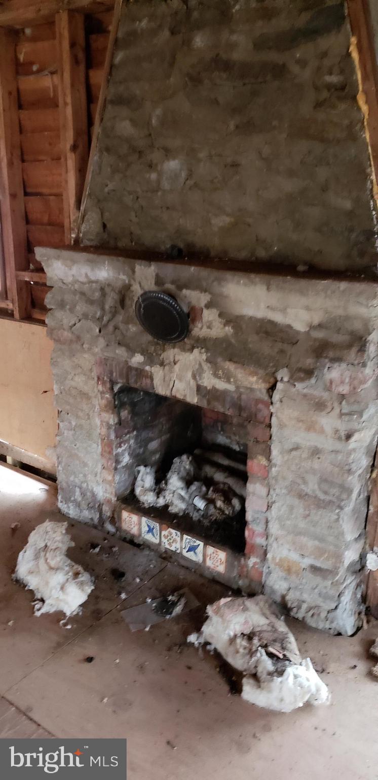 8570 Cobb Road Manassas, VA 20112 - Photo 21 of 46 Stone fireplace