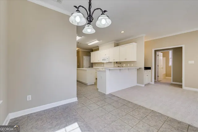 a view of a kitchen with a sink and dishwasher a kitchen view