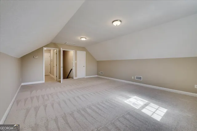 a view of road with large trees