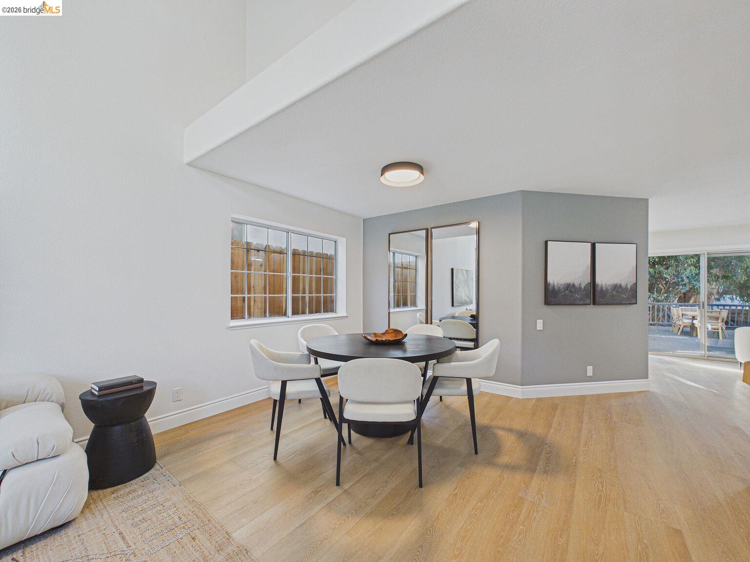 2392 Austin Court Castro Valley, CA 94546 - Photo 19 of 60 Dining room featuring light wood-style flooring and healthy amount of natural light