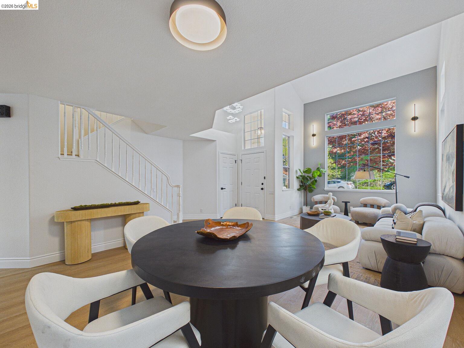 2392 Austin Court Castro Valley, CA 94546 - Photo 25 of 60 Dining room with wood finished floors and a high ceiling