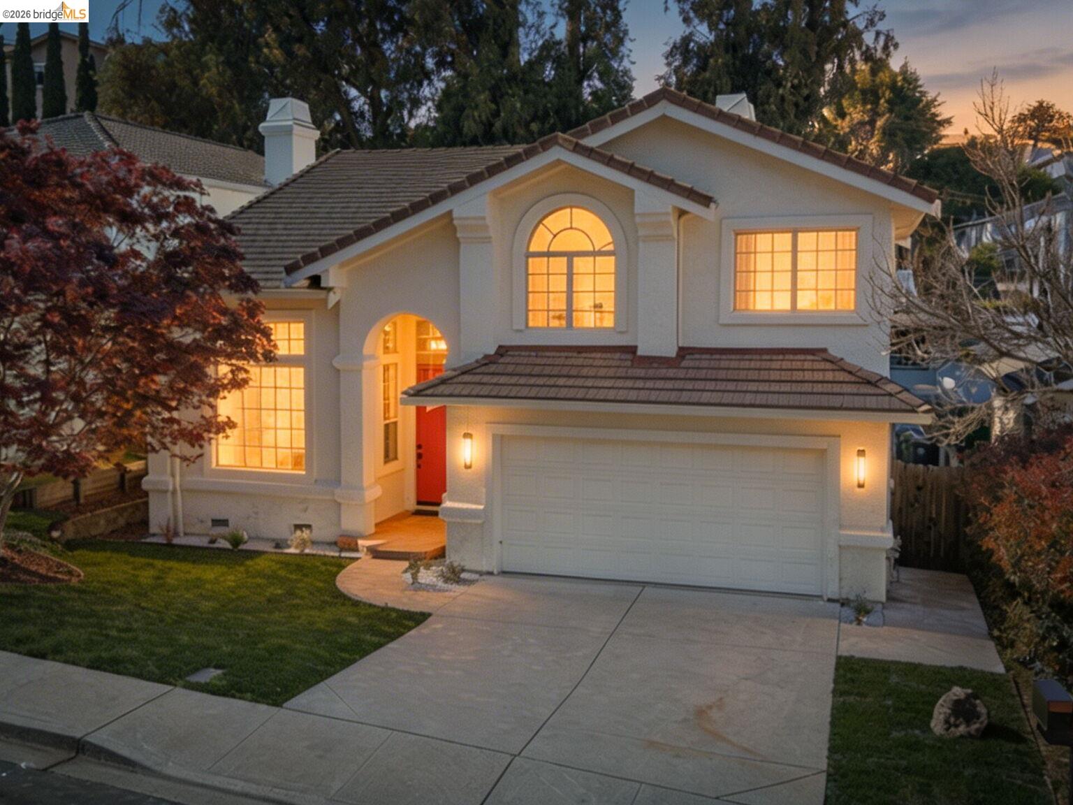 2392 Austin Court Castro Valley, CA 94546 - Photo 3 of 60 View of front facade with a tiled roof, concrete driveway, a front yard, a chimney, and an attached garage