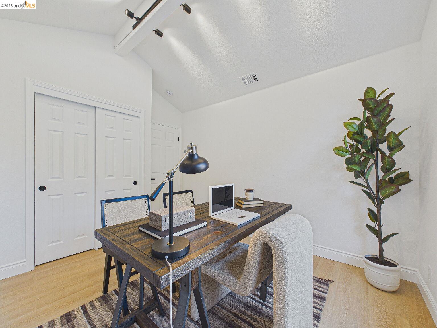 2392 Austin Court Castro Valley, CA 94546 - Photo 52 of 60 Office space featuring light wood-style flooring and vaulted ceiling with beams- Stage as office