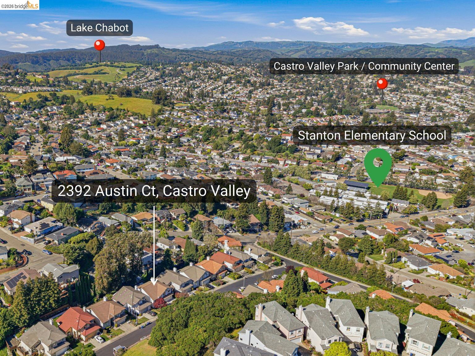 2392 Austin Court Castro Valley, CA 94546 - Photo 8 of 60 Aerial view of property's location with nearby suburban area and a mountainous background