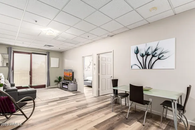 a view of a livingroom with furniture and window