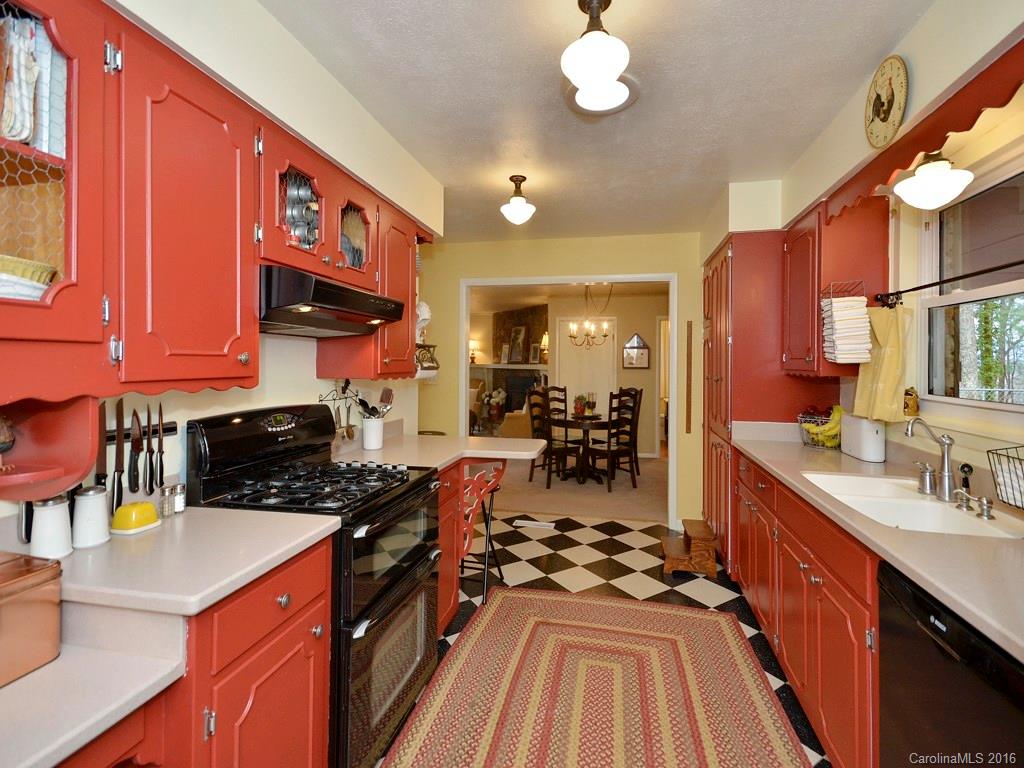 43 Cold Springs Road Hendersonville, NC 28792 - Photo 6 of 24 a kitchen with sink cabinets and stove