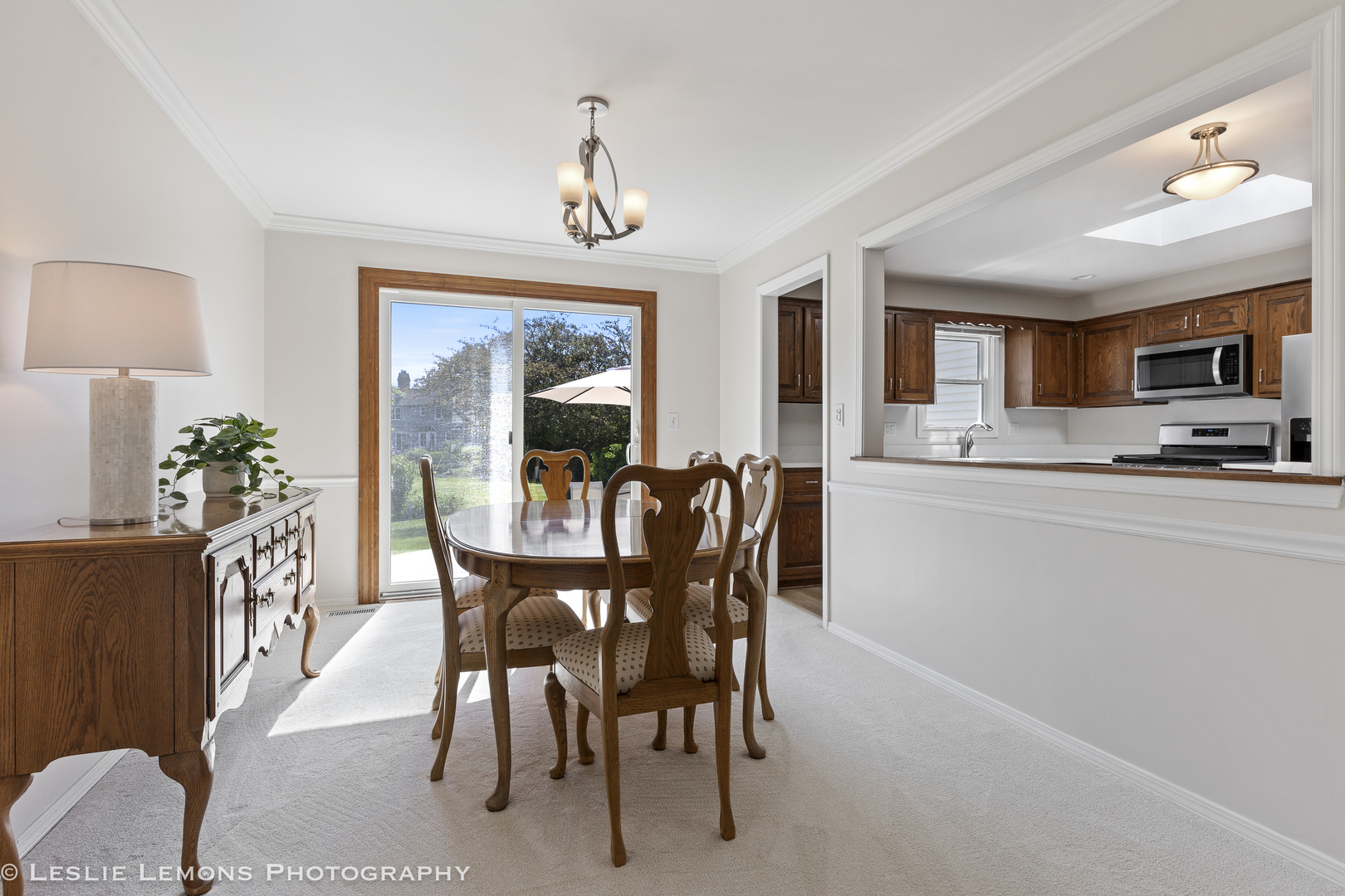 1604 Fender Road Naperville, IL 60565 - Photo 16 of 29 a view of a dining room with furniture window and wooden floor