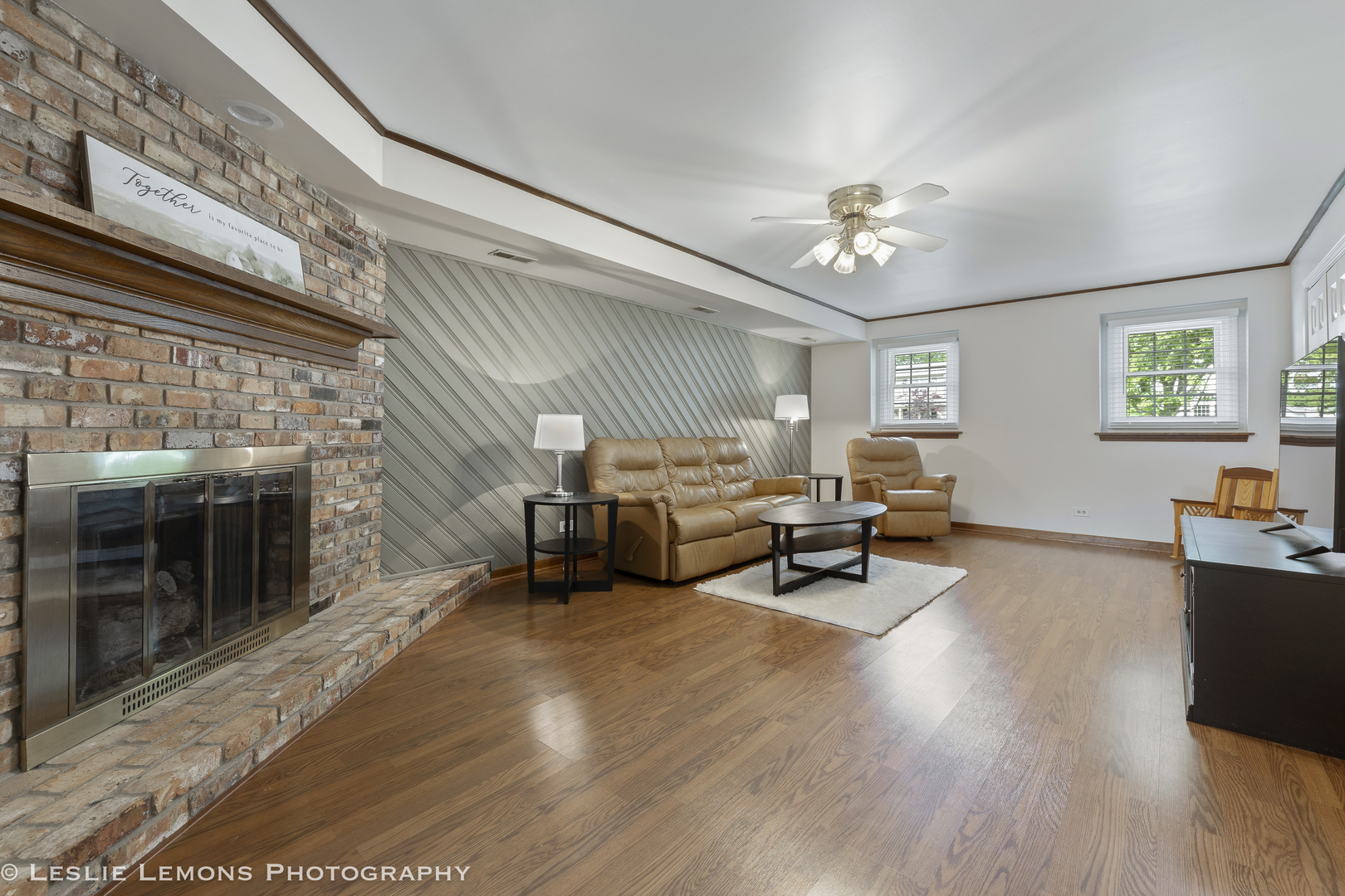 1604 Fender Road Naperville, IL 60565 - Photo 19 of 29 a living room with furniture and a fireplace