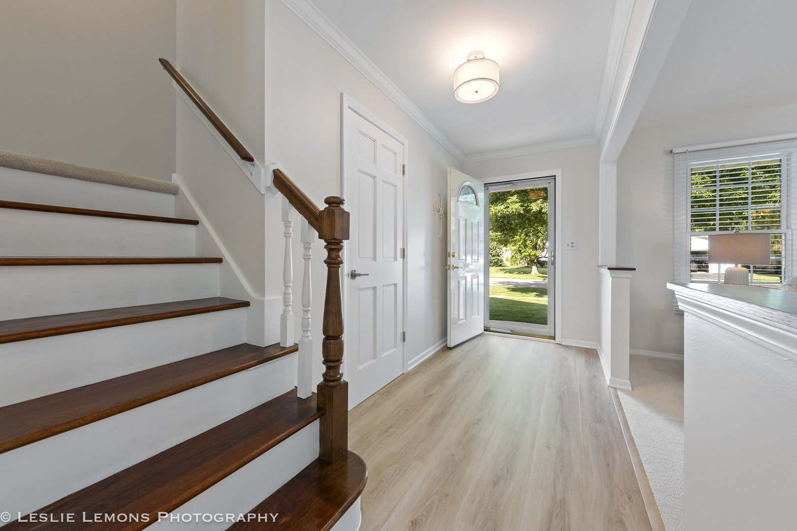 1604 Fender Road Naperville, IL 60565 - Photo 3 of 29 a view of entryway with wooden floor and stairs