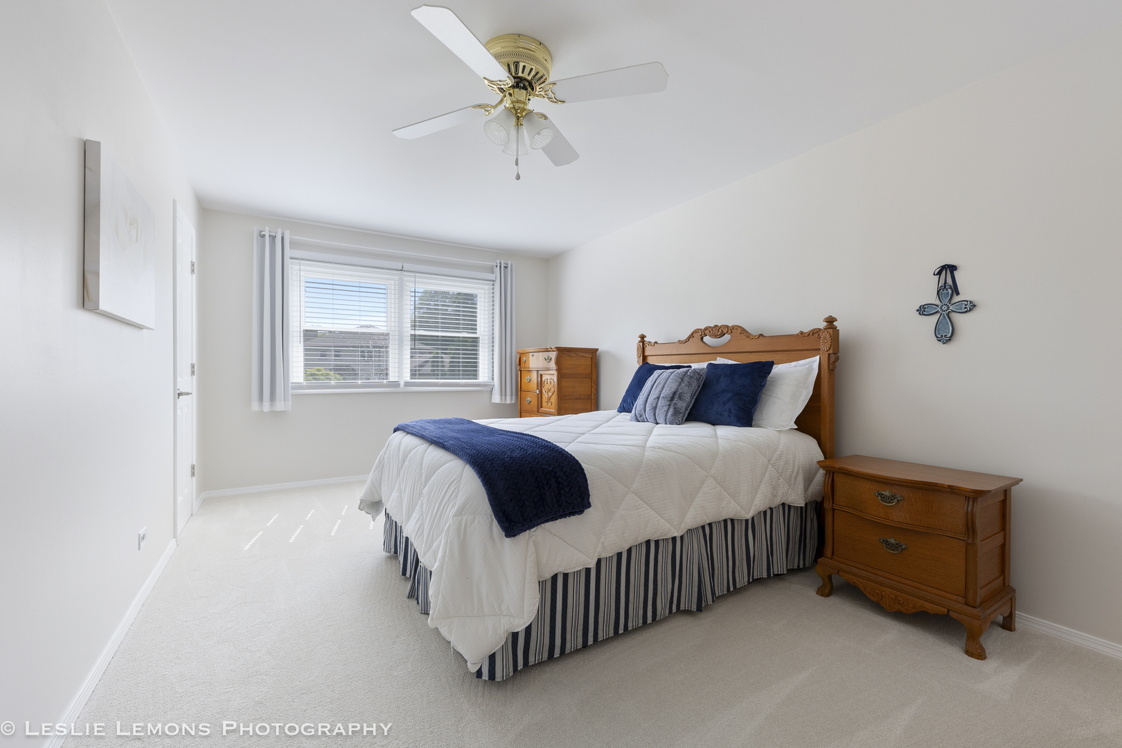 1604 Fender Road Naperville, IL 60565 - Photo 5 of 29 a bedroom with a bed dresser and a window