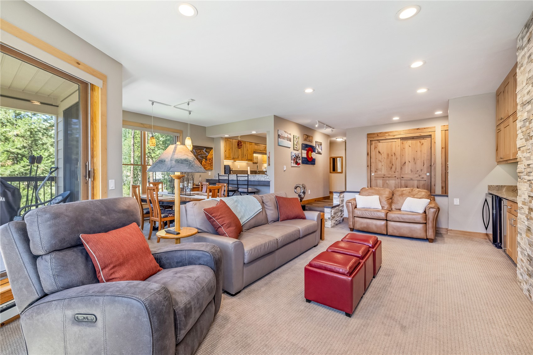 180 Tennis Club Road, Unit 1636 Keystone, CO 80435 - Photo 6 of 28 Carpeted living room featuring rail lighting
