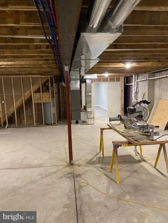 a view of a hall with wooden floor