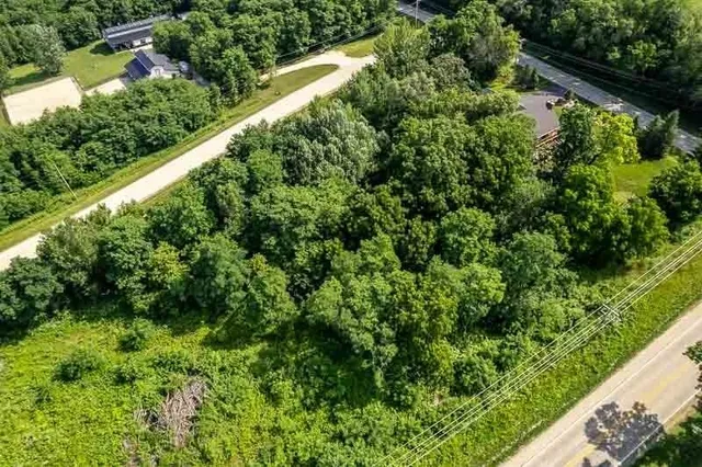 a view of a garden with a building
