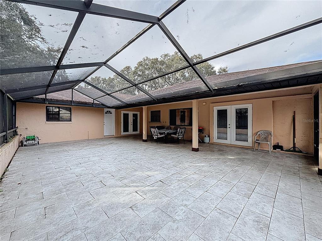 209 1st Street Tavares, FL 32778 - Photo 17 of 21 a view of a house with a backyard