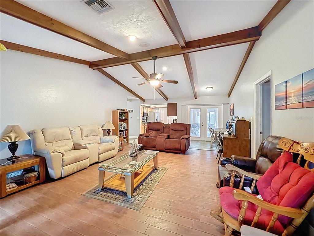 209 1st Street Tavares, FL 32778 - Photo 7 of 21 a living room with furniture