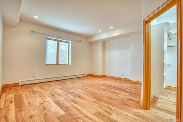 a view of an empty room and window