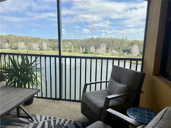 a balcony view with a furniture