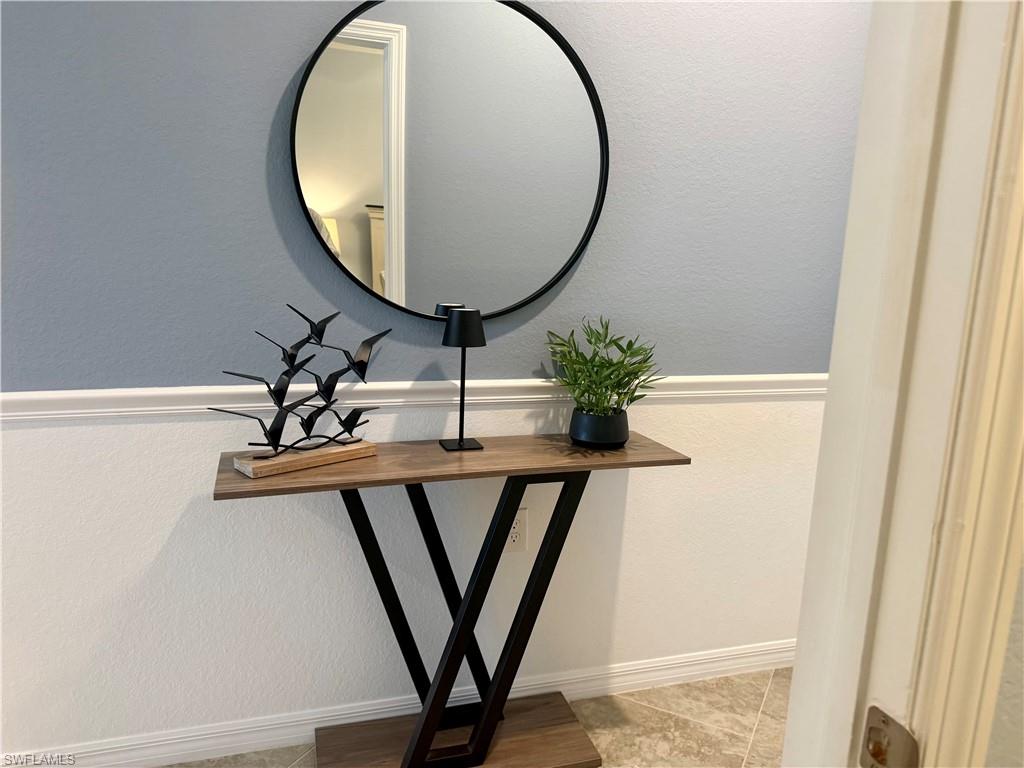 9584 Trevi Court, Unit 5242 Naples, FL 34113 - Photo 25 of 50 a view of a mirror in a mirror