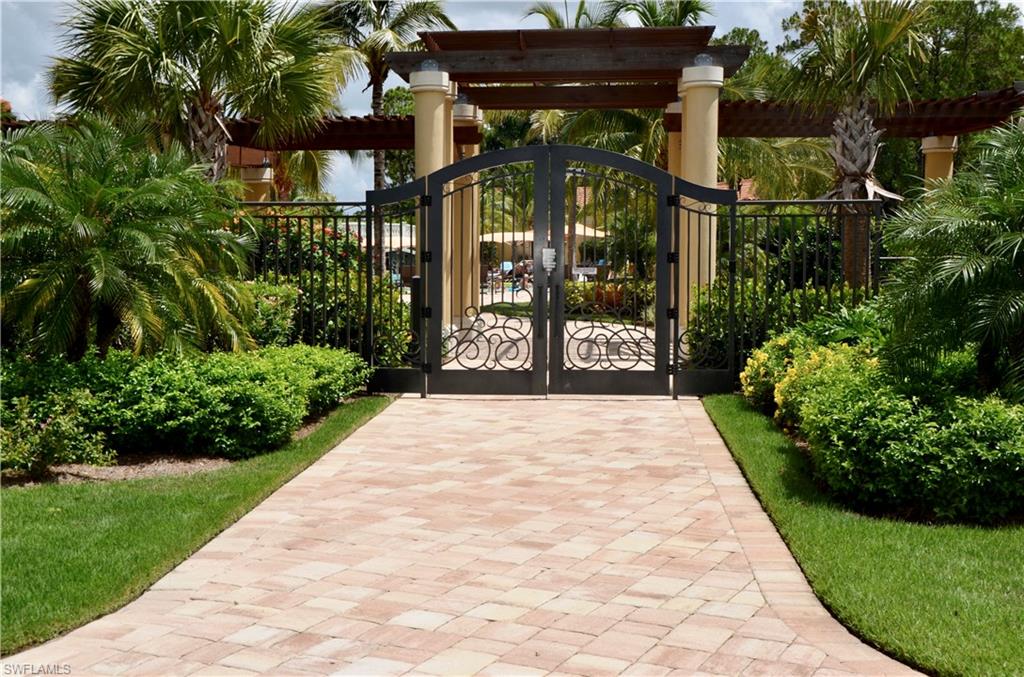 9584 Trevi Court, Unit 5242 Naples, FL 34113 - Photo 42 of 50 a view of a pathway of a house with a garden