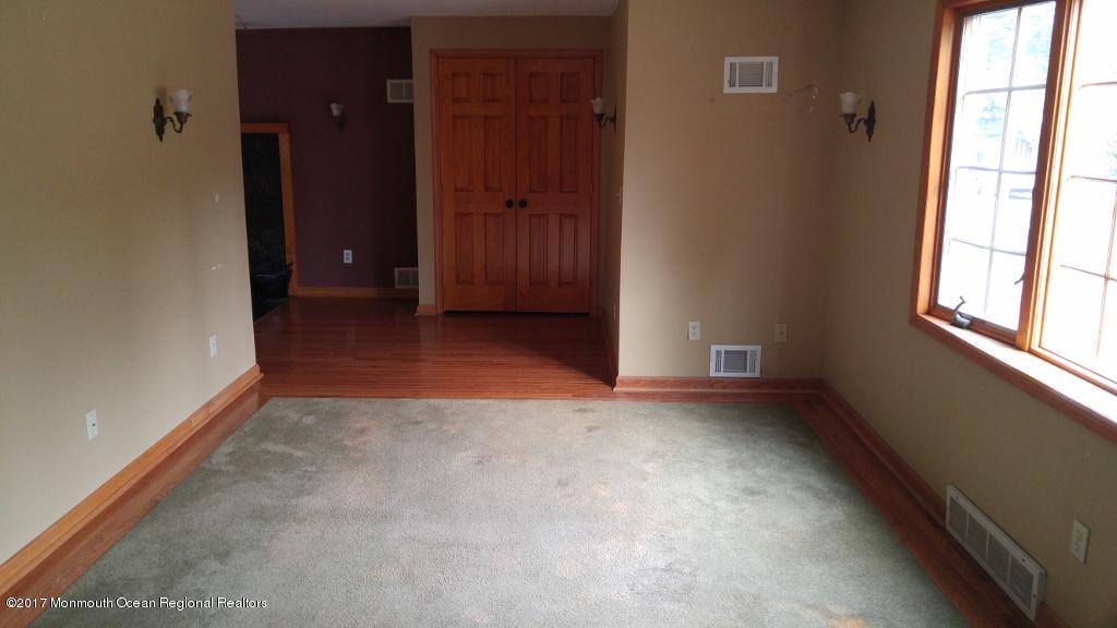 222 Newman Springs Road Red Bank, NJ 07701 - Photo 2 of 12 an empty room with windows