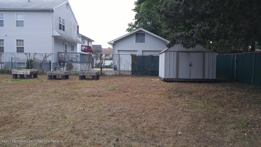 222 Newman Springs Road Red Bank, NJ 07701 - Photo 11 of 12 a view of a house with a yard