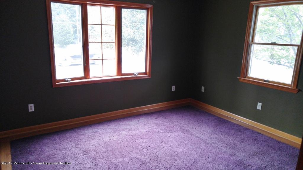 222 Newman Springs Road Red Bank, NJ 07701 - Photo 6 of 12 an empty room with a window