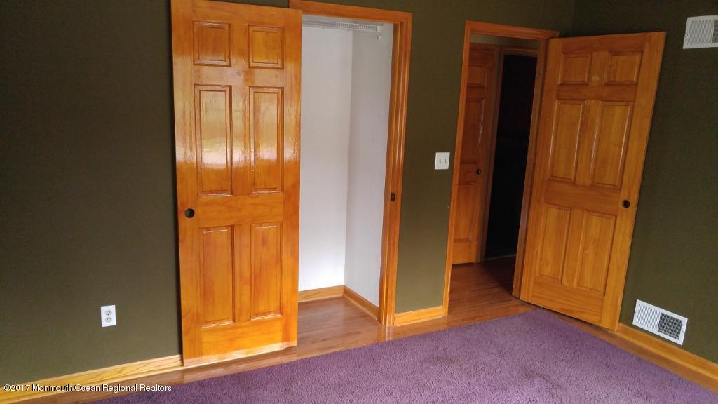 222 Newman Springs Road Red Bank, NJ 07701 - Photo 7 of 12 an empty room with windows and entrance