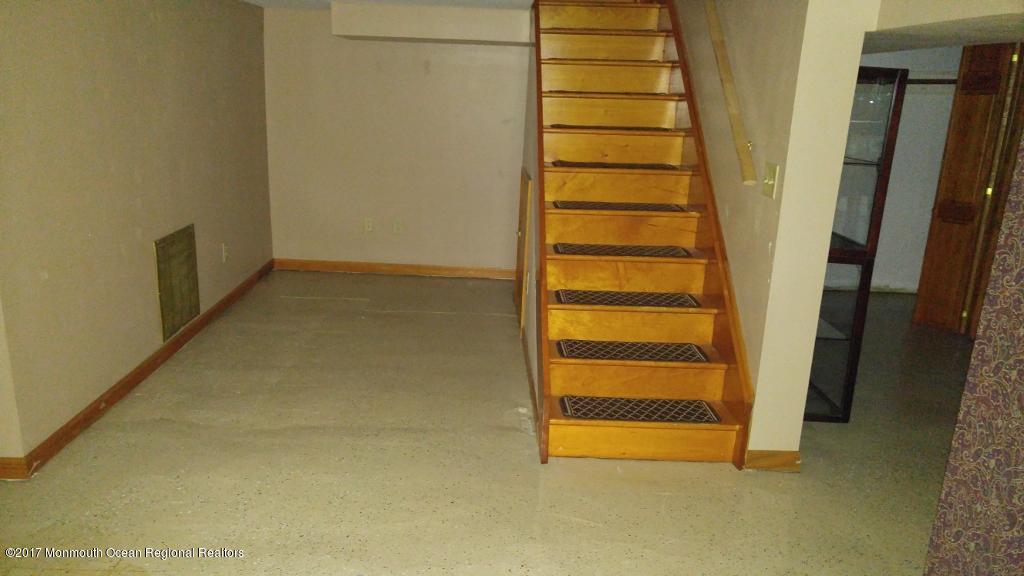 222 Newman Springs Road Red Bank, NJ 07701 - Photo 9 of 12 an empty room with a door
