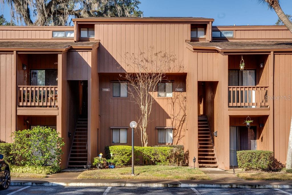 a view of a house with a street