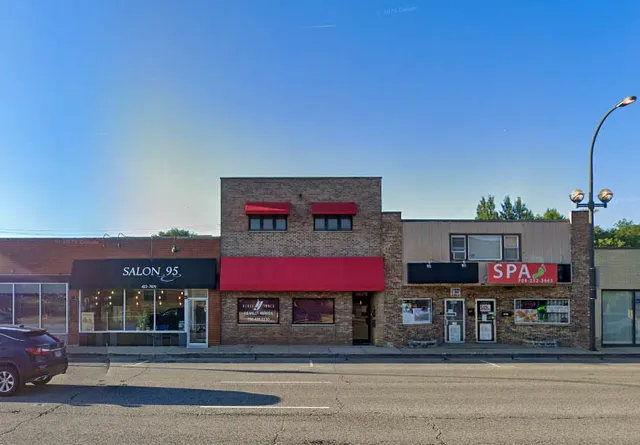 a view of a cafe with a table and chairs