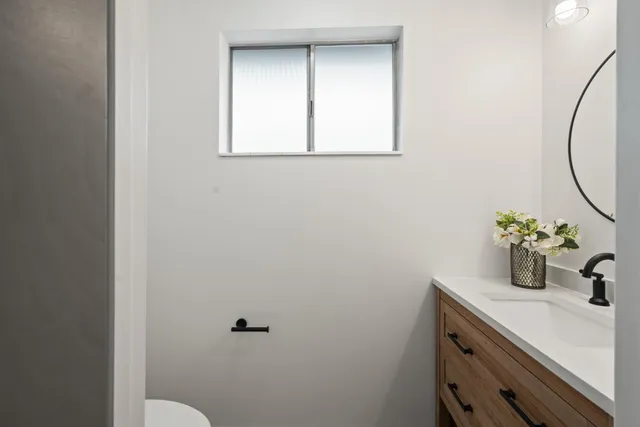 a bathroom with a sink and a toilet