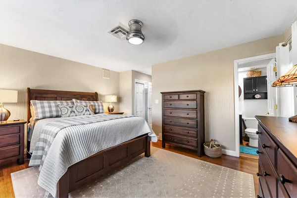 a bedroom with a bed and furniture