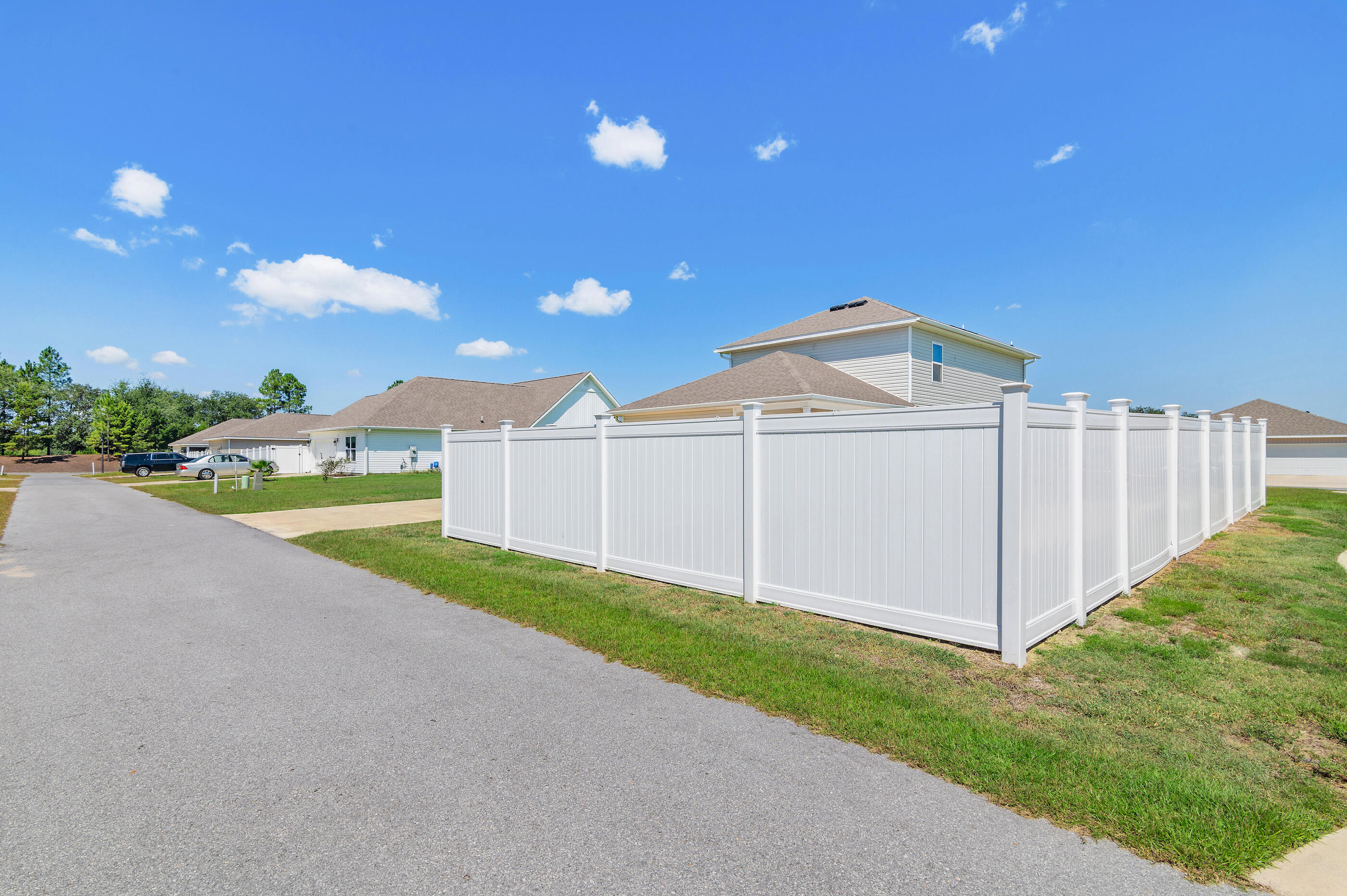 56 Silverthorn Street Freeport, FL 32439 - Photo 29 of 31 a view of a backyard with grass and entertaining space
