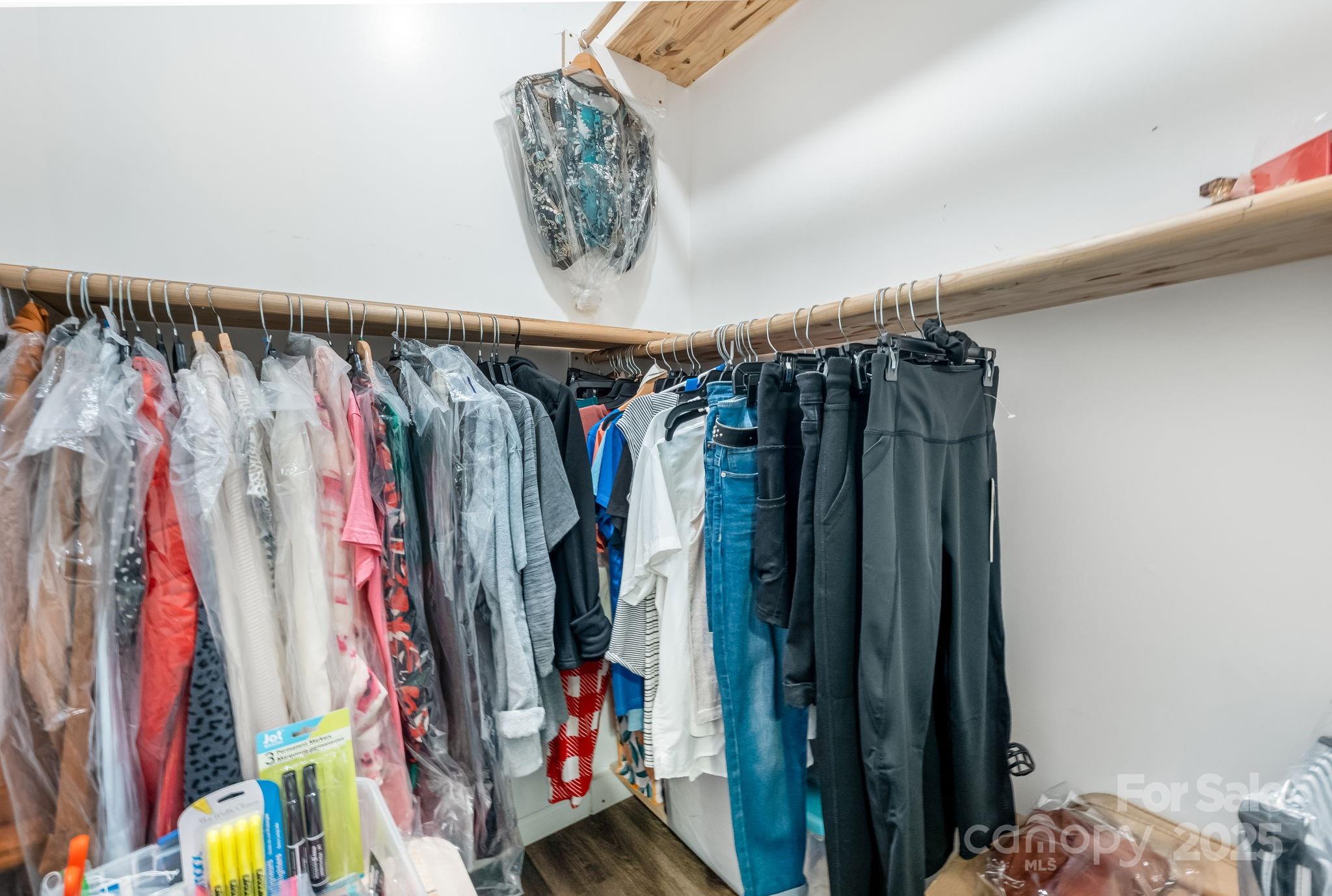 845 Spindale Street Spindale, NC 28160 - Photo 14 of 30 a view of walk in closet with clothes