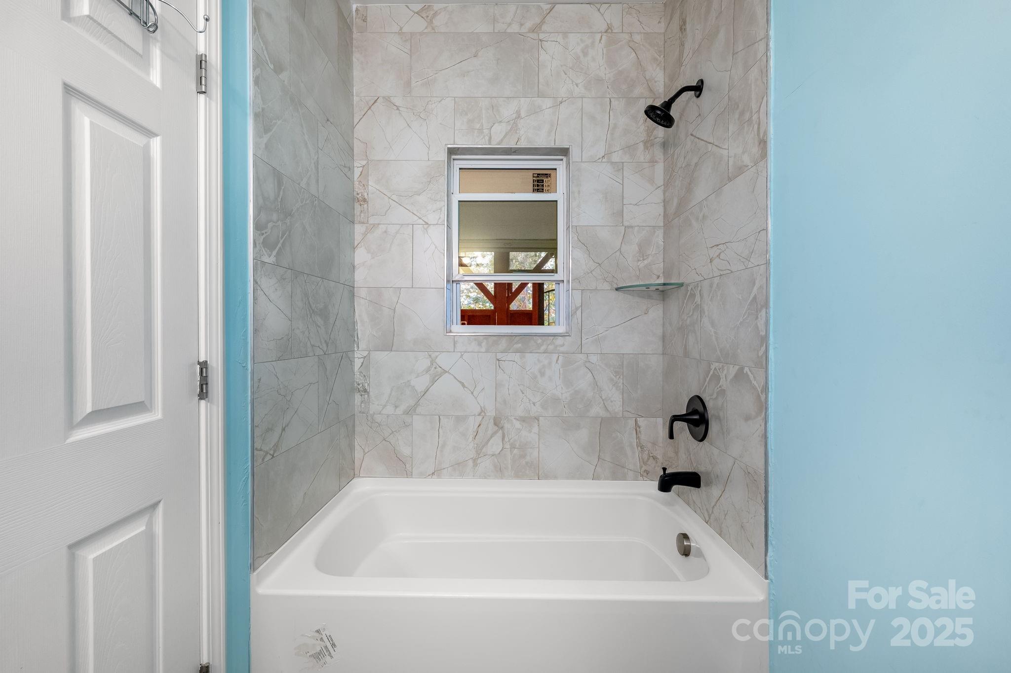 845 Spindale Street Spindale, NC 28160 - Photo 16 of 30 a bathroom with a bathtub