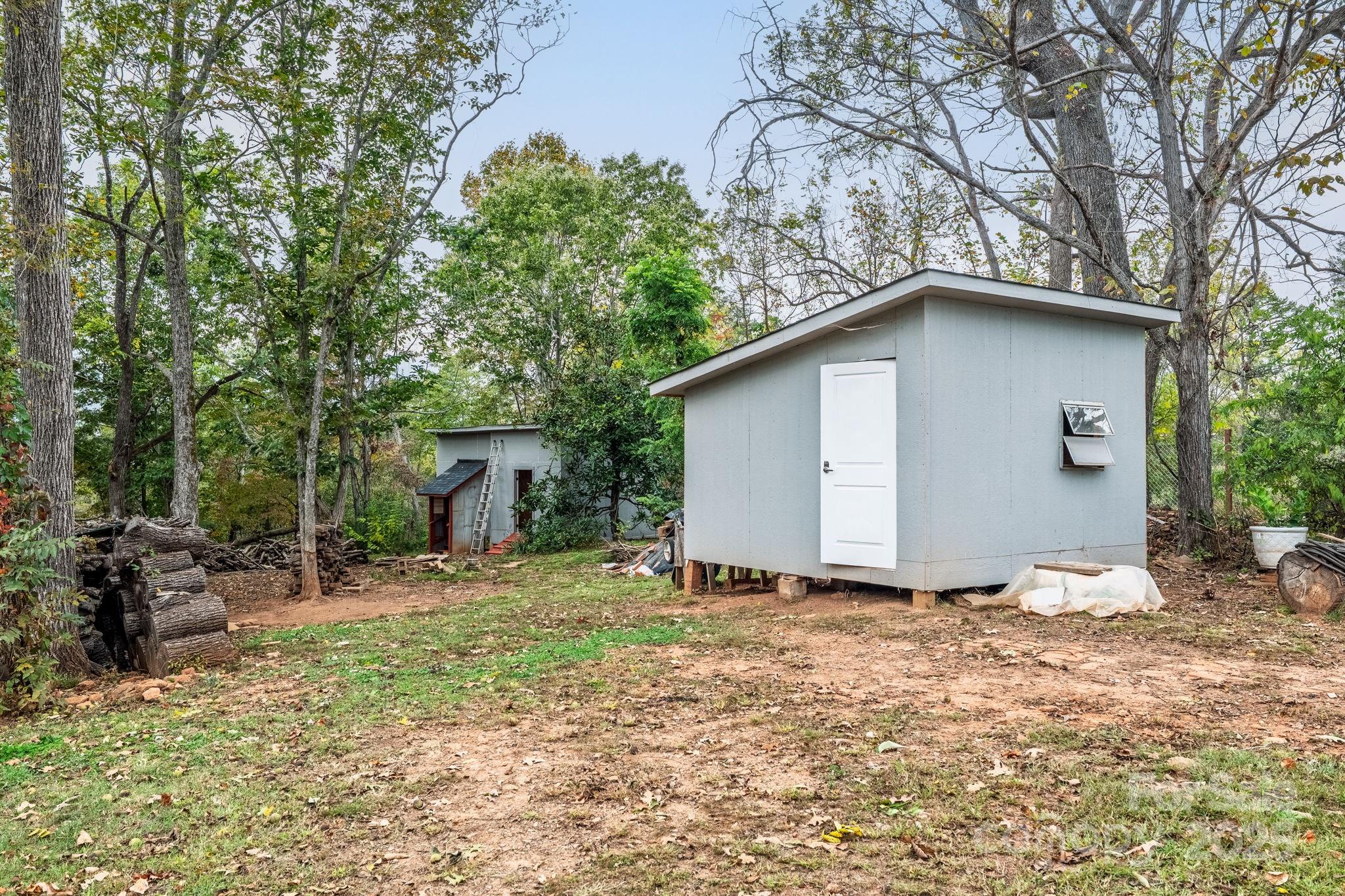 845 Spindale Street Spindale, NC 28160 - Photo 25 of 30 a house with trees in the background