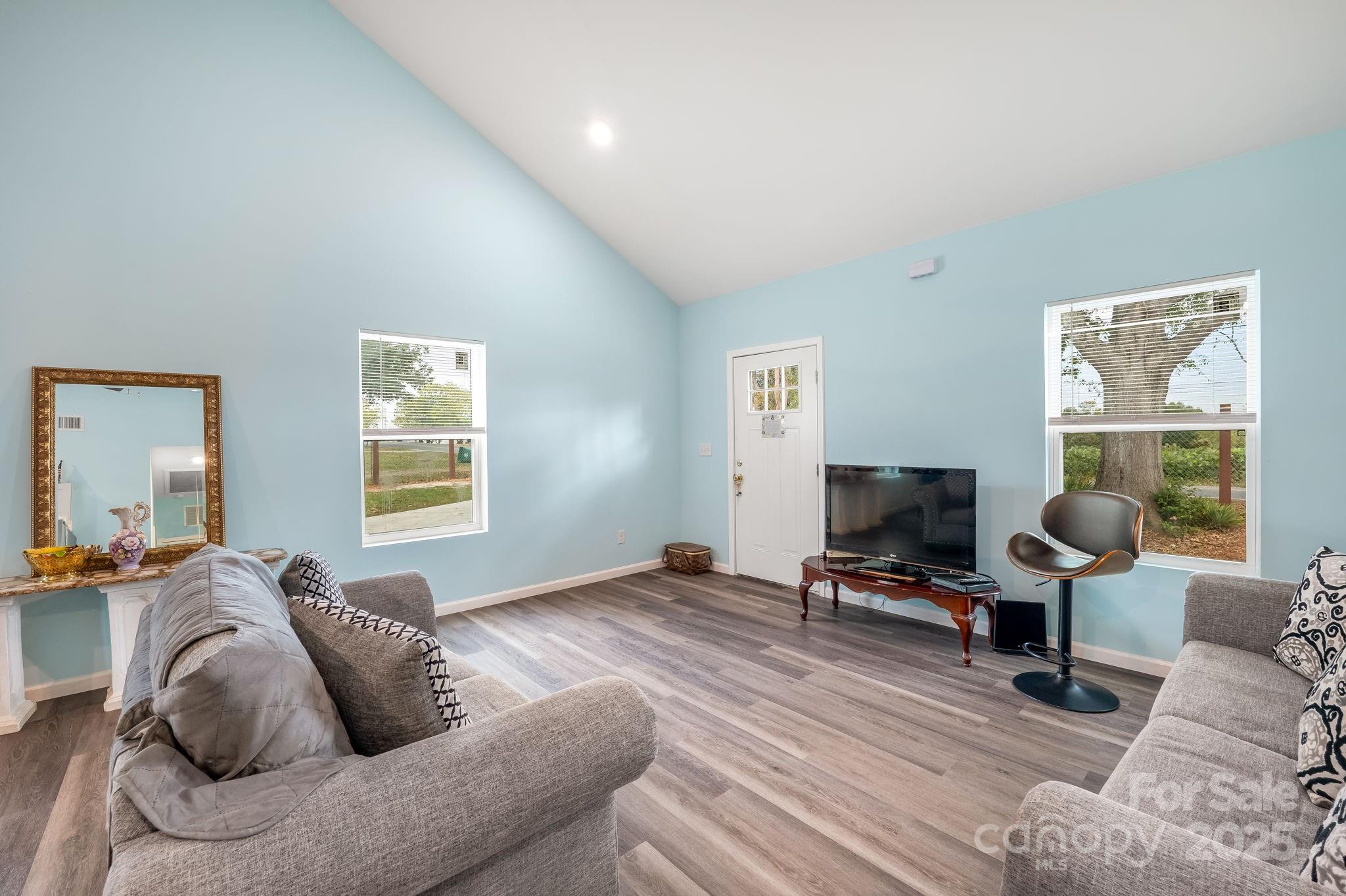 845 Spindale Street Spindale, NC 28160 - Photo 4 of 30 a living room with furniture and a window