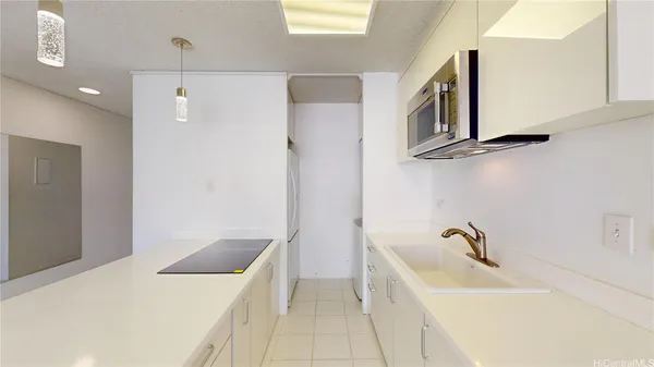 a bathroom with a bathtub and a sink