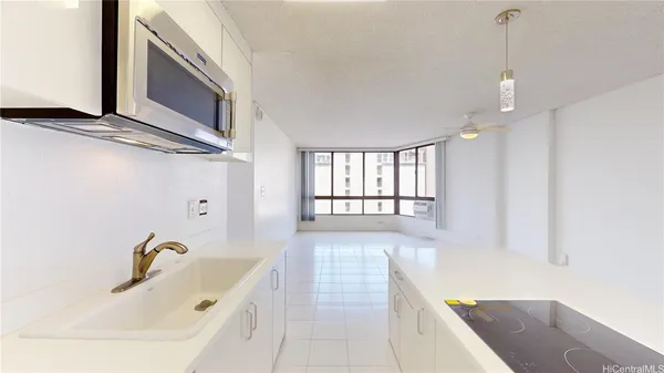 a bathroom with a bathtub and a window